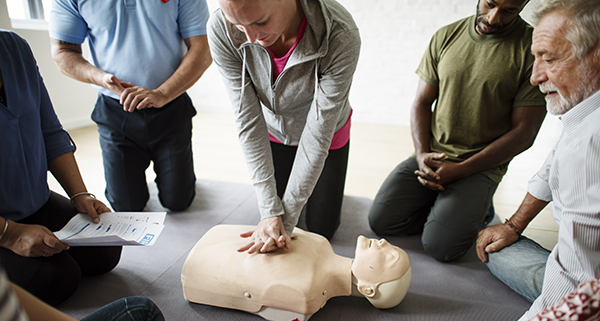 People learning CPR.